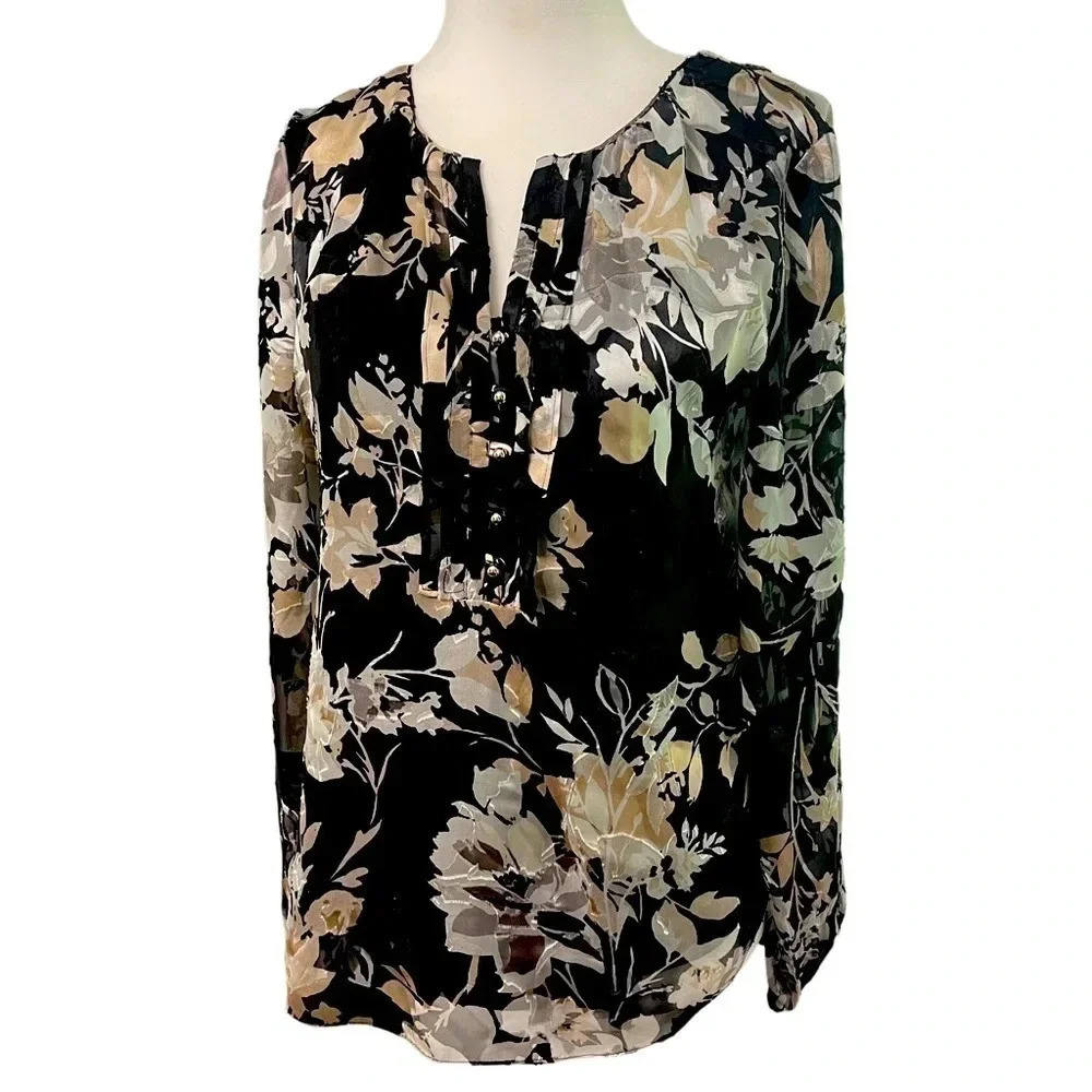 White House Black Market split neck floral top, sheer sleeves.